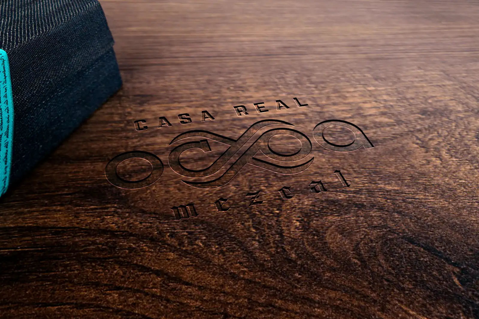Logotipo de Ocxoa sobre madera