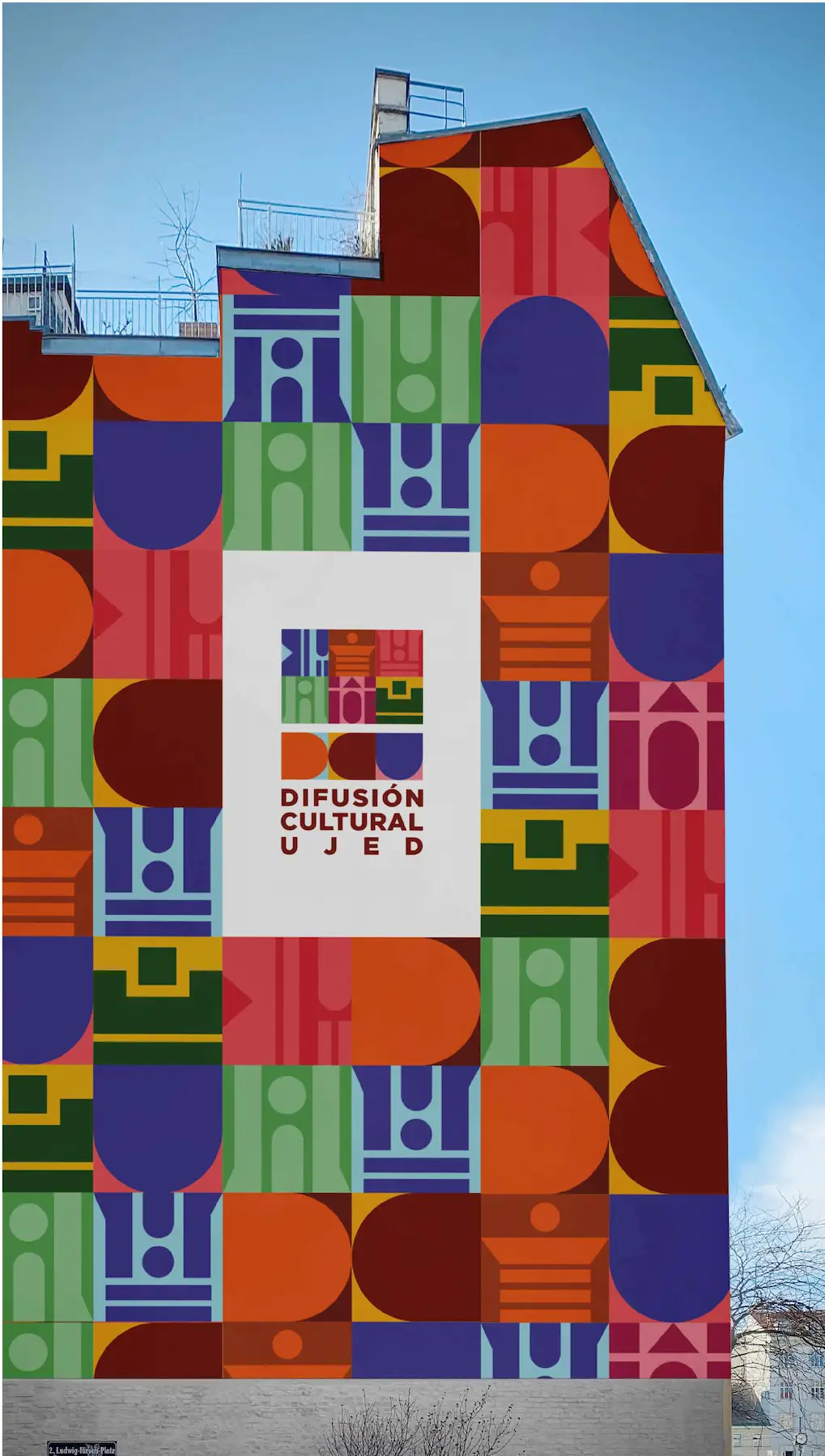 Montaje de mural con imagen y logotipo diseñados para Difusión CUltural UJED
